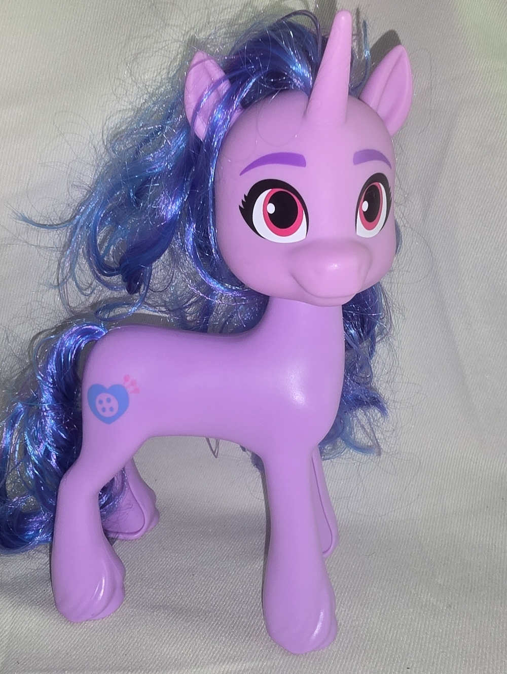 My Little Pony Izzy Moonbow figure, featuring a purple body, blue hair Novelty